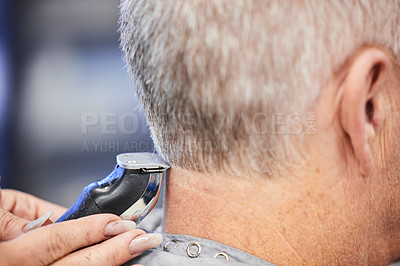 Buy stock photo Hands, trimmer and mature man in salon for haircut by hairdresser, barber and hair care service. Barbershop, hairstylist and elderly person or client for makeover, grooming and cutting as self care