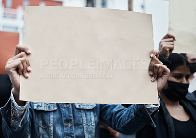 Buy stock photo Shot of a group of people marching at a corona virus vaccine protest