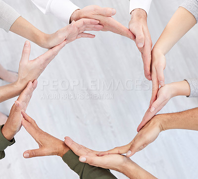Buy stock photo Circle, teamwork and synergy of people hands in collaboration, workflow and group or team building from above. Integration, formation and support, cooperation or community of women and men connection