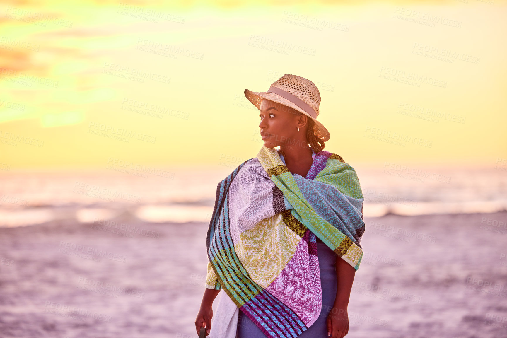 Buy stock photo Shot of a beautiful young woman enjoying alone time at the beach