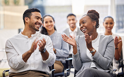 Buy stock photo Cropped shot of a group of businesspeople applauding while sitting in the office during a conference