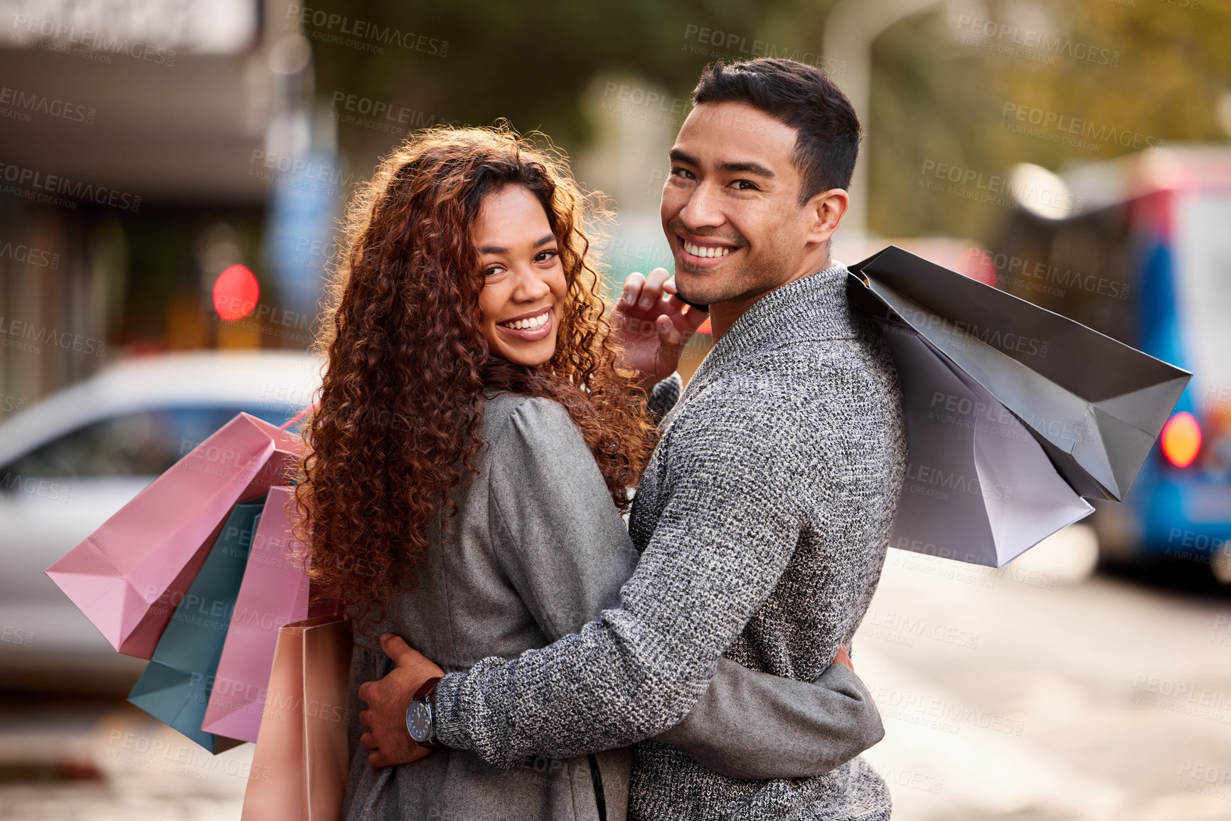 Buy stock photo Happy couple, portrait smile and shopping bags in city together for fashion, gift or buying outdoors. Man and woman in relationship smiling for customer discount, purchase or payment in urban town