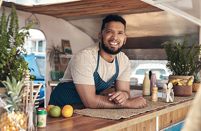 Buy stock photo Shot of a businessman in his food truck