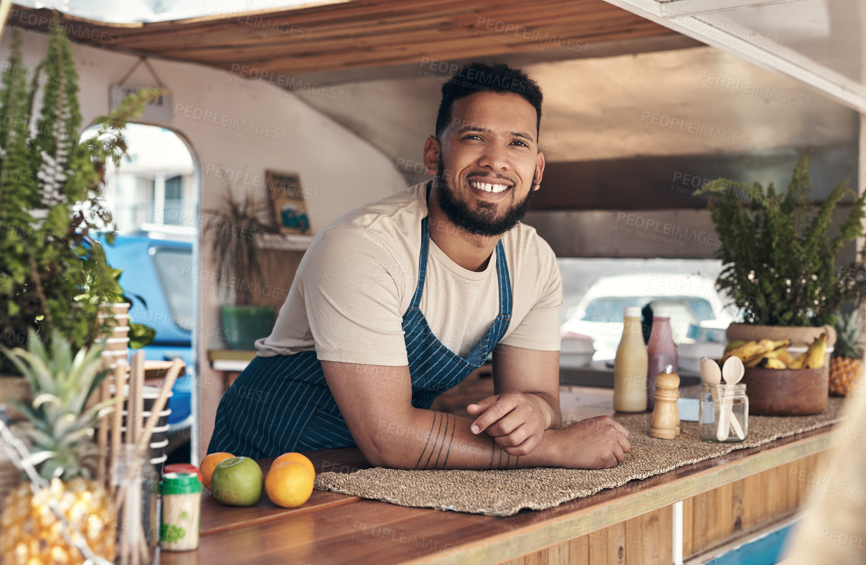 Buy stock photo Shot of a businessman in his food truck