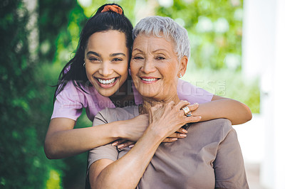 Buy stock photo Portrait of a young nurse caring for an older woman