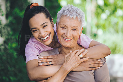 Buy stock photo Portrait of a young nurse caring for an older woman