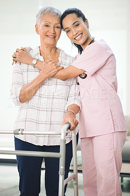 Buy stock photo Portrait of an older woman using a walker and walking with the assistance of a physiotherapist