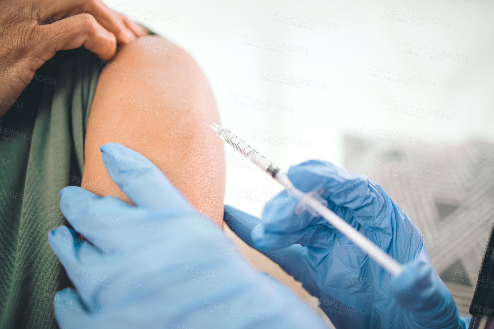 Buy stock photo Cropped shot of a doctor giving an unrecognizable woman an injection inside