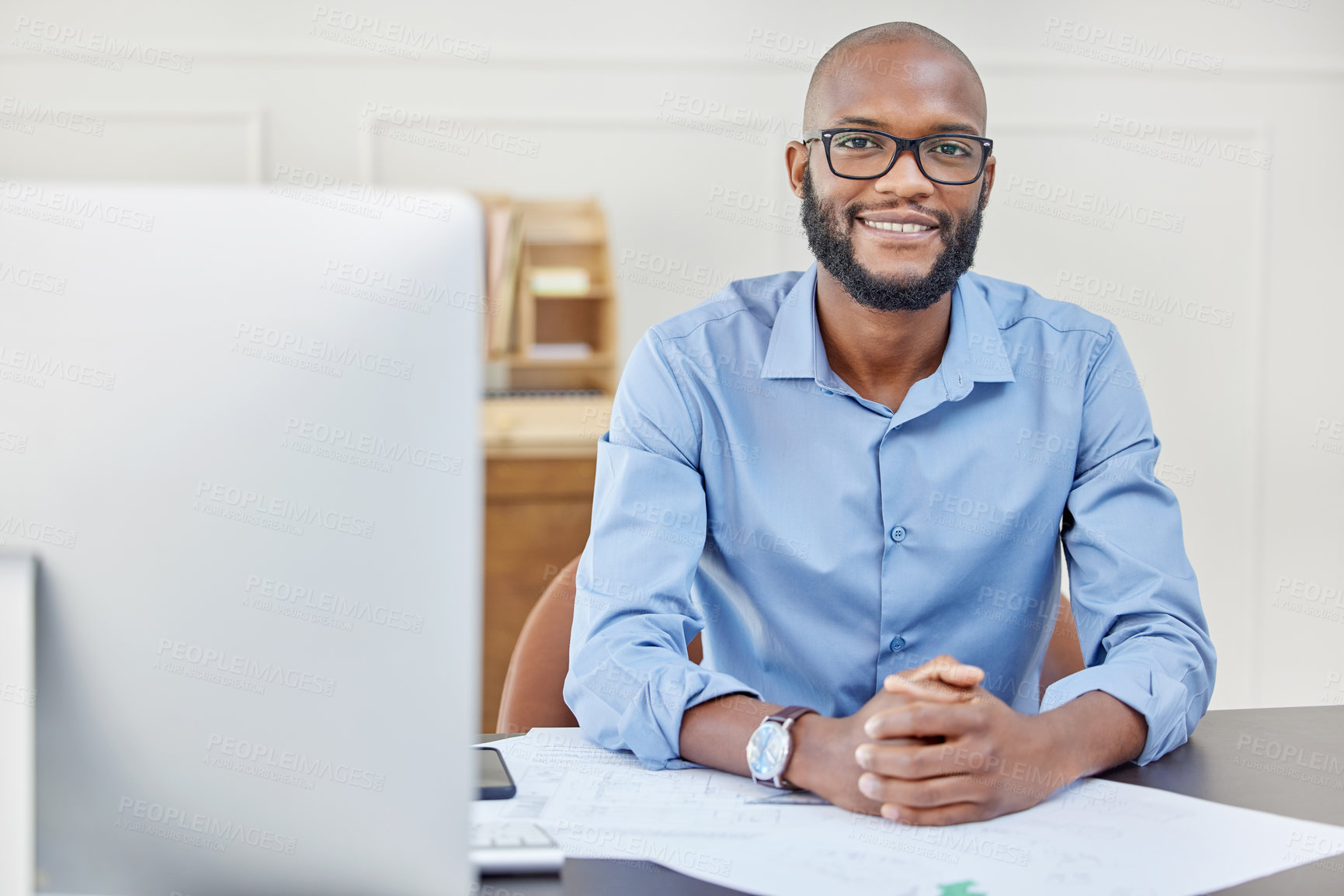 Buy stock photo Businessman, smile and portrait with computer at desk for research, planning and internet connection. Happy, black person or entrepreneur with a desktop pc in home office for remote or architecture