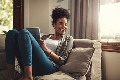 Buy stock photo Happy, tablet and black woman on sofa in morning for social media, online shopping and internet. Relax, window and person on digital tech for website, news and research on weekend in living room