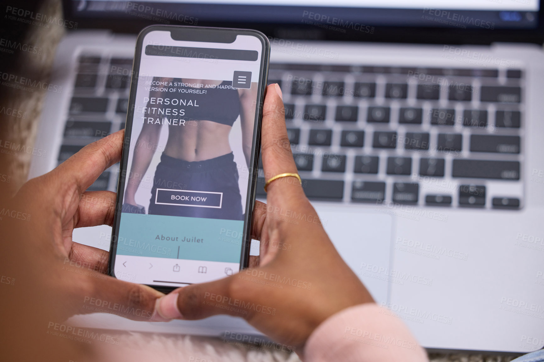 Buy stock photo High angle shot of an unrecognizable female entrepreneur working on her sports blog at home