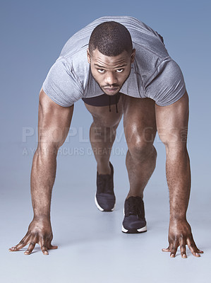 Buy stock photo Fitness, portrait and running with sports black man at start of race in studio on gray background. Cardio, exercise and serious with confident runner getting ready for challenge or competition