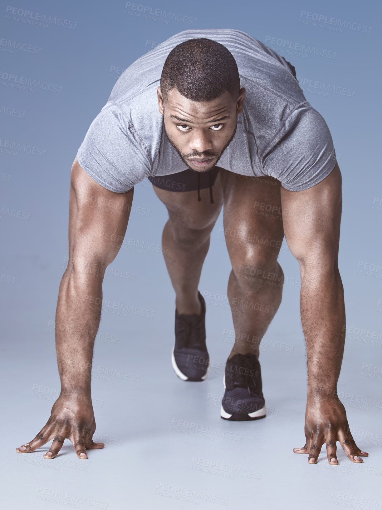 Buy stock photo Fitness, portrait and running with sports black man at start of race in studio on gray background. Cardio, exercise and serious with confident runner getting ready for challenge or competition