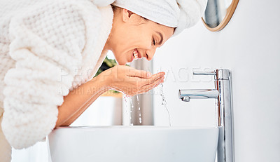 Buy stock photo Water splash, skincare and happy woman washing her face in a bathroom for beauty, hygiene and wellness. Facial, cleaning and female with drops for dermatology and cleansing treatment in her home