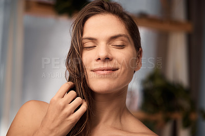 Buy stock photo Shot of a young woman relaxing after a shower