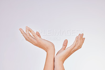 Buy stock photo Studio shot of an unrecognisable woman’s beautiful hands against a grey background