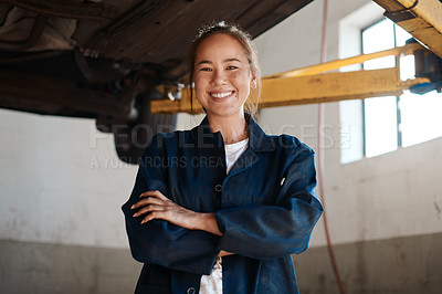 Buy stock photo Portrait, Asian woman and arms crossed as car mechanic in workshop with pride for career growth. Female person, confident and smile for startup or small business as engineer with opportunity