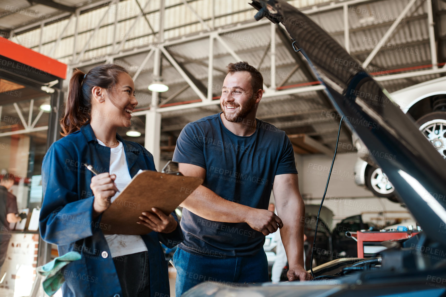 Buy stock photo People, car mechanic and workshop with clipboard for inspection on teamwork, collaboration and maintenance. Happy, employee and vehicle repairs or service as engineer with small business and garage