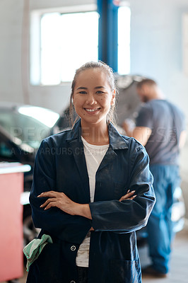 Buy stock photo Portrait, mechanic or woman with arms crossed in garage, skills or service with small business. Face, equality or entrepreneur in auto repair shop, industry or opportunity with startup or fix vehicle