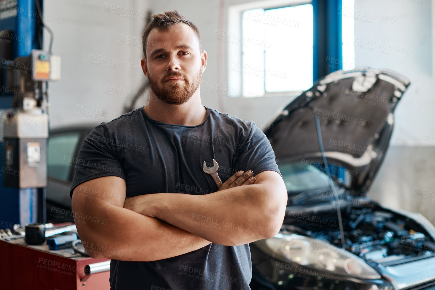 Buy stock photo Technician, man and arms crossed by car in garage for auto repair, service or safety in portrait. Mechanic, person and small business for vehicle maintenance with tools, parts or industry at workshop