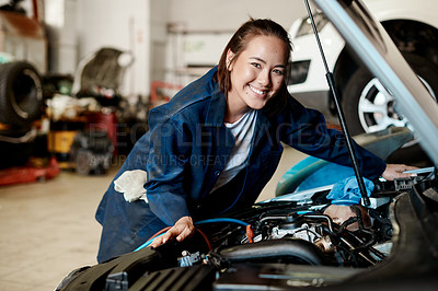 Buy stock photo Car, mechanic and portrait of woman in garage for engine maintenance, repair or service. Auto, expert and inspection with smile of happy asian vehicle engineer or technician in professional workshop