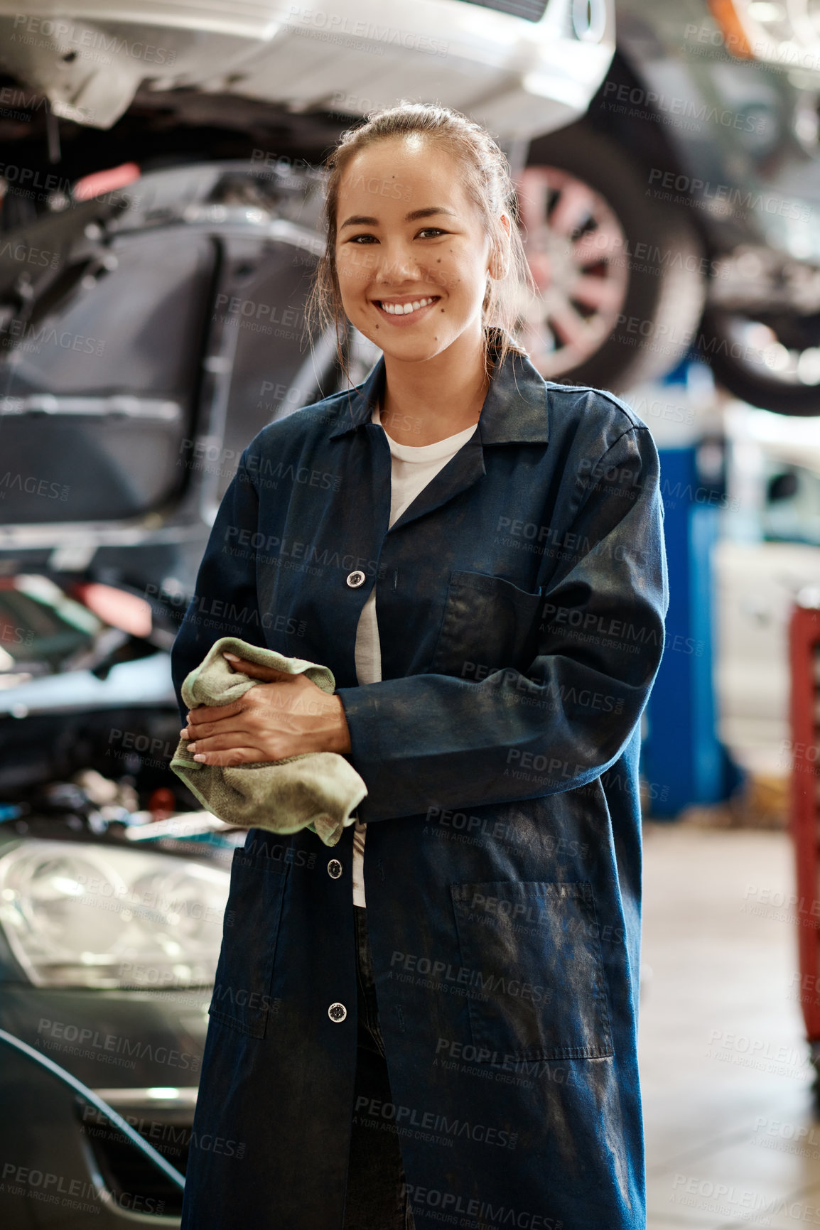 Buy stock photo Cleaning, hands and portrait of woman in workshop for car service, maintenance or auto insurance. Cloth, engine and female mechanic in garage for oil change, motor repair or vehicle quality assurance