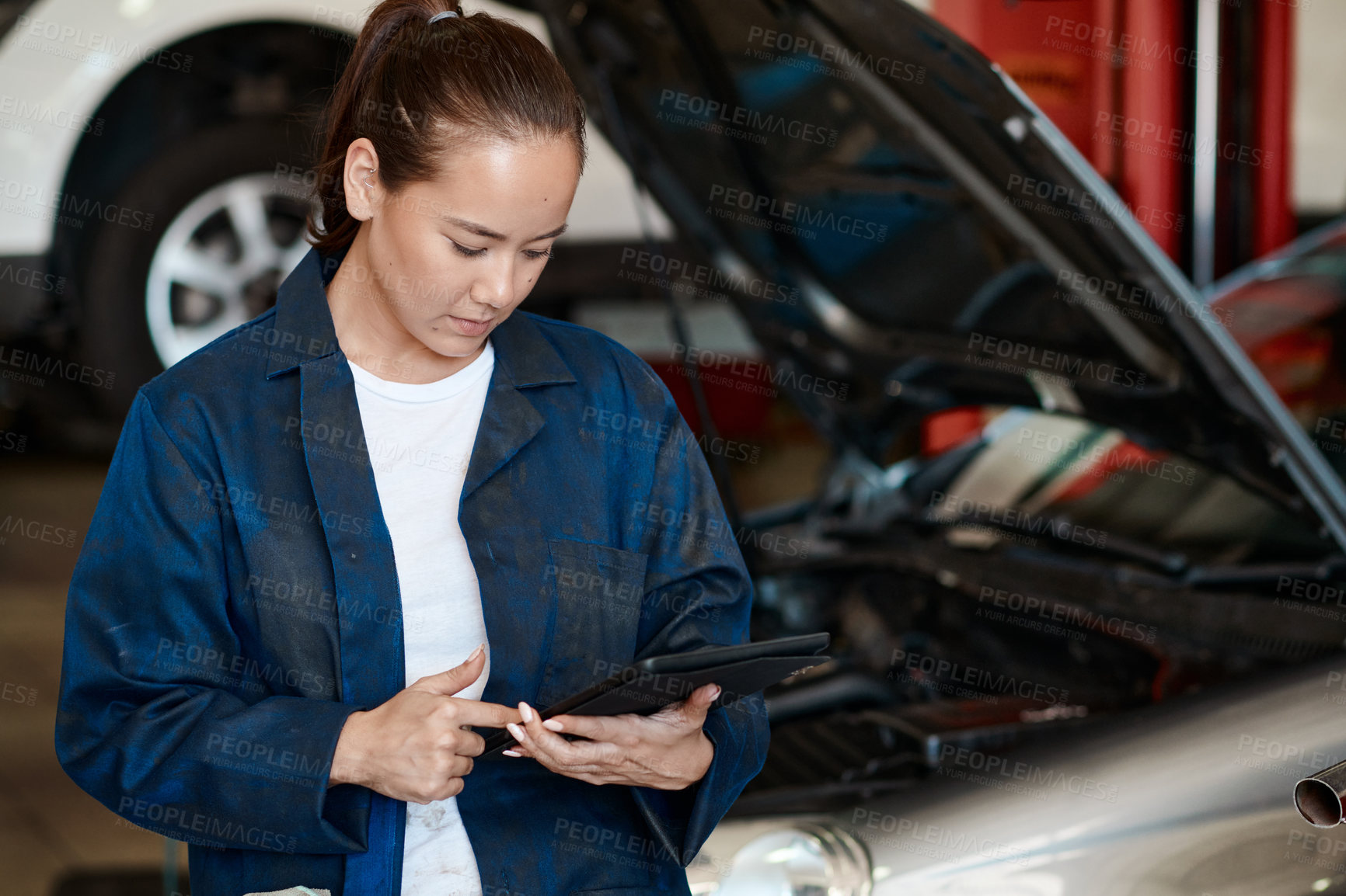 Buy stock photo Tablet, inspection and woman in workshop with car service, maintenance or online motor insurance. Tech, engine and female mechanic in garage on digital app for checklist, repair and quality assurance