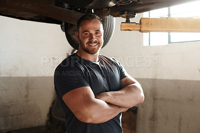 Buy stock photo Happy, man and arms crossed as car mechanic in workshop with pride for career growth. Garage, portrait and confident for startup or small business as engineer with repairs, service and maintenance