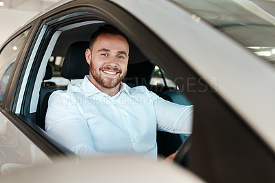 Buy stock photo New car, showroom and portrait of happy man in vehicle for purchase, good service or loan success. Customer, driving and proud driver in dealership for transportation, automobile shopping or warranty