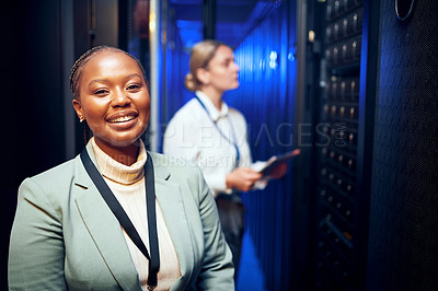 Buy stock photo Portrait of a young woman working in a server room