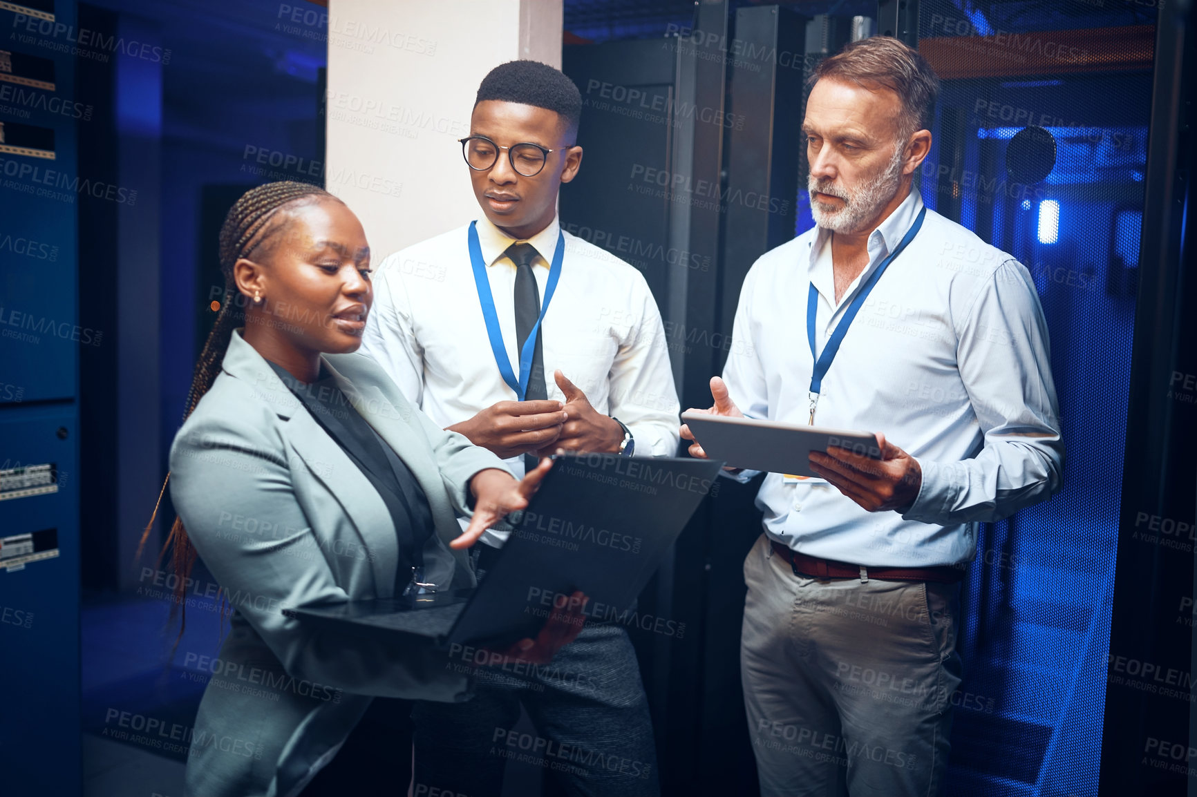 Buy stock photo Women, tablet and team with maintenance in server room with cybersecurity, system check or collaboration. Programmer, tech and group with advice for programming, review or IT solution at data center