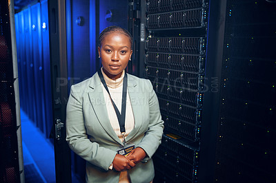 Buy stock photo Portrait of a young woman working in a server room