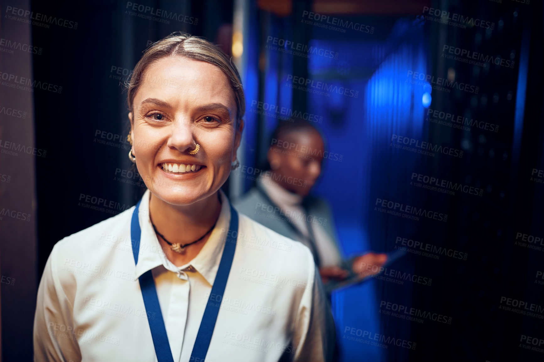 Buy stock photo Portrait of a young woman working in a server room