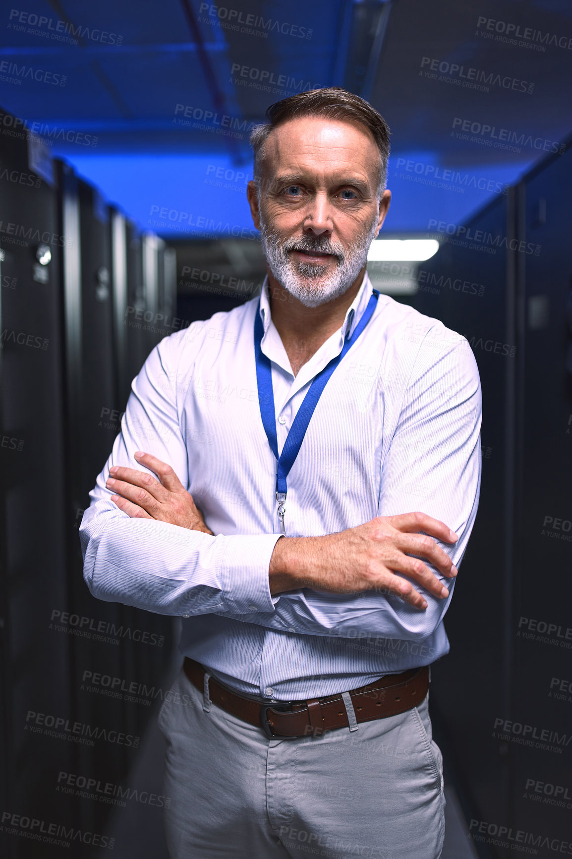 Buy stock photo Portrait of a mature man working in a server room