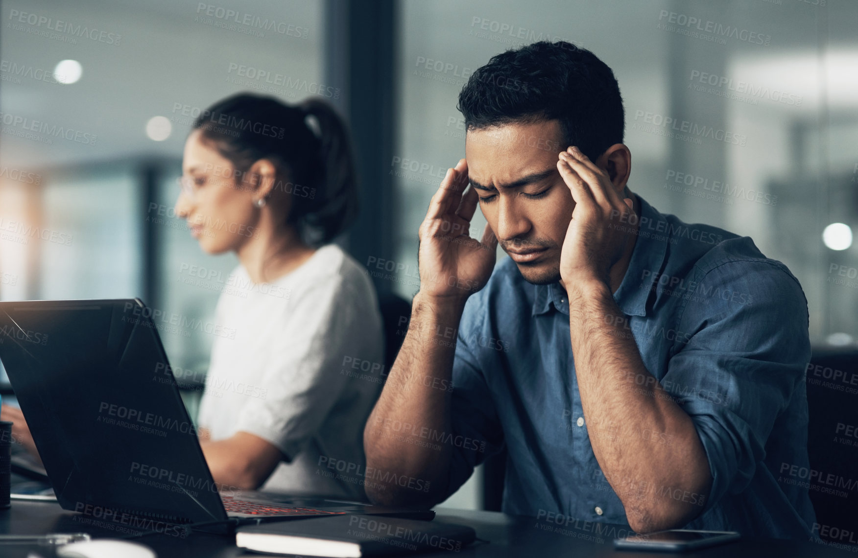 Buy stock photo Tired, man and headache with stress on laptop for overworked pressure or deadline in office. Frustrated, male person or employee with migraine, pain or eye strain on computer for mistake or burnout