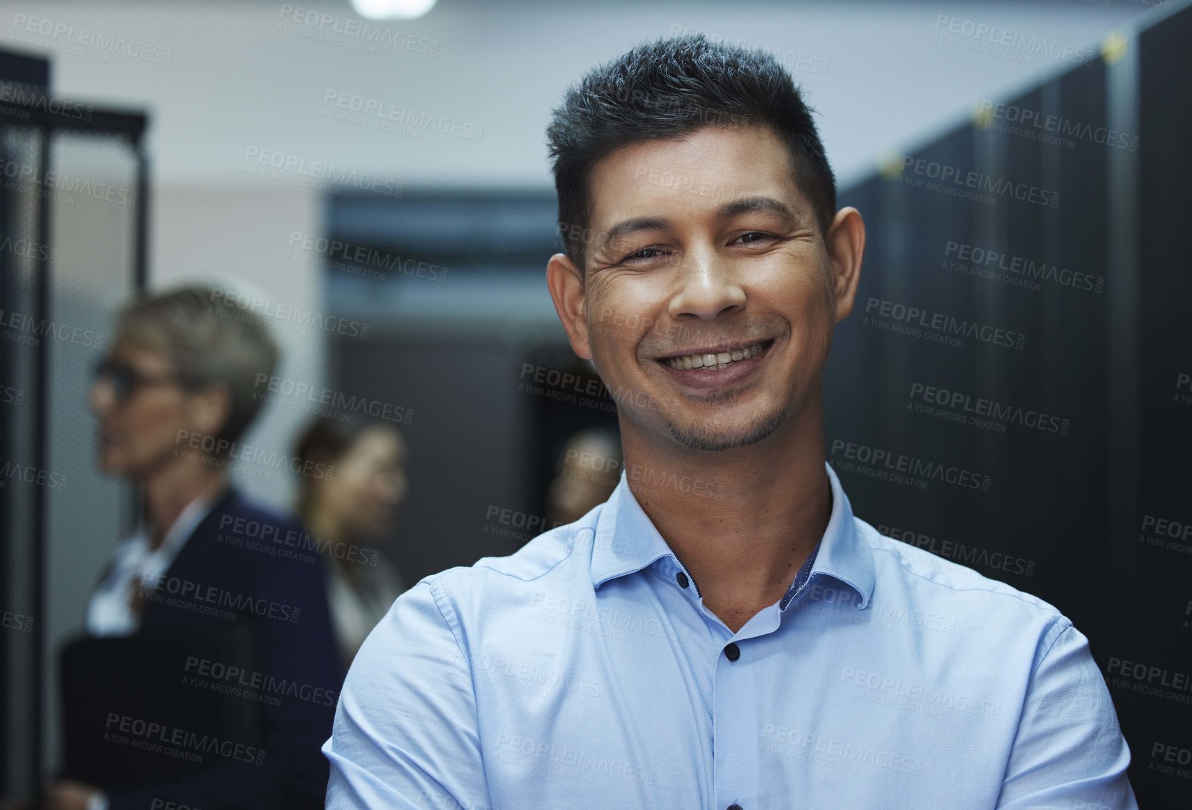 Buy stock photo Portrait of a happy man working in a server room
