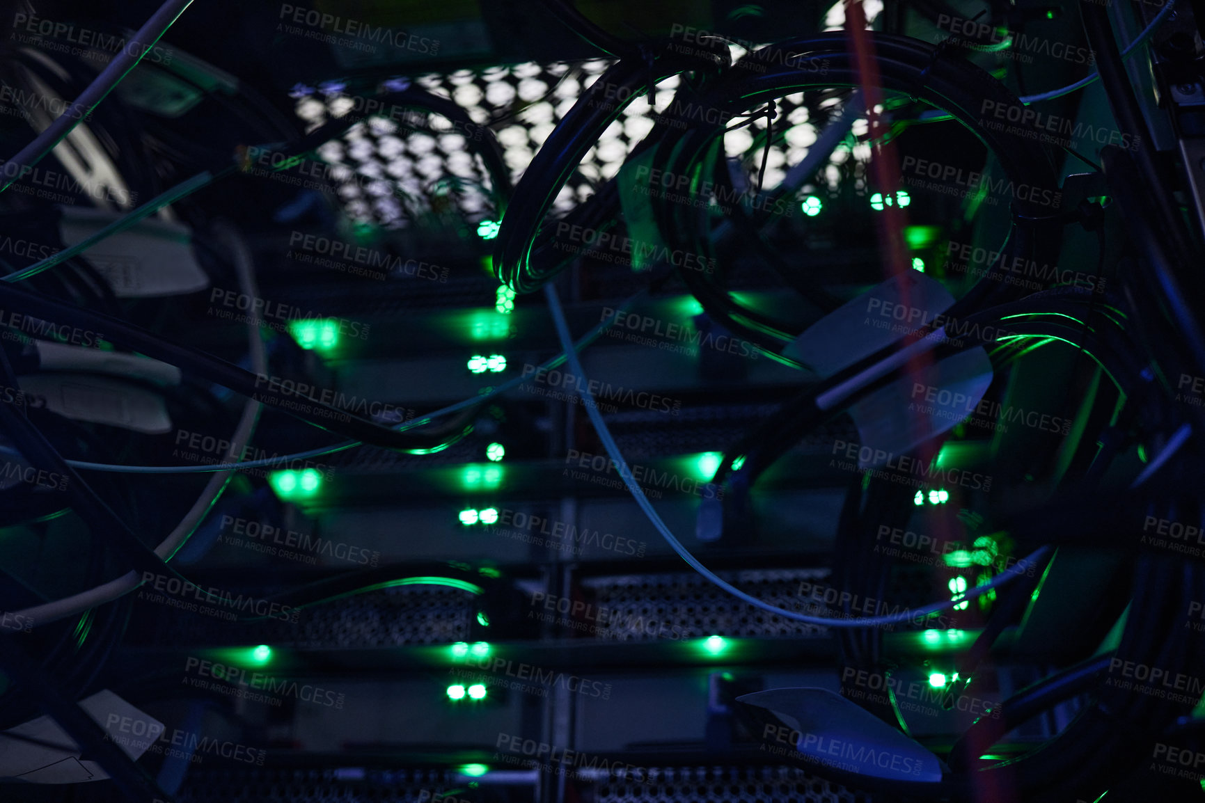 Buy stock photo Cropped shot of a large, dark and empty server room