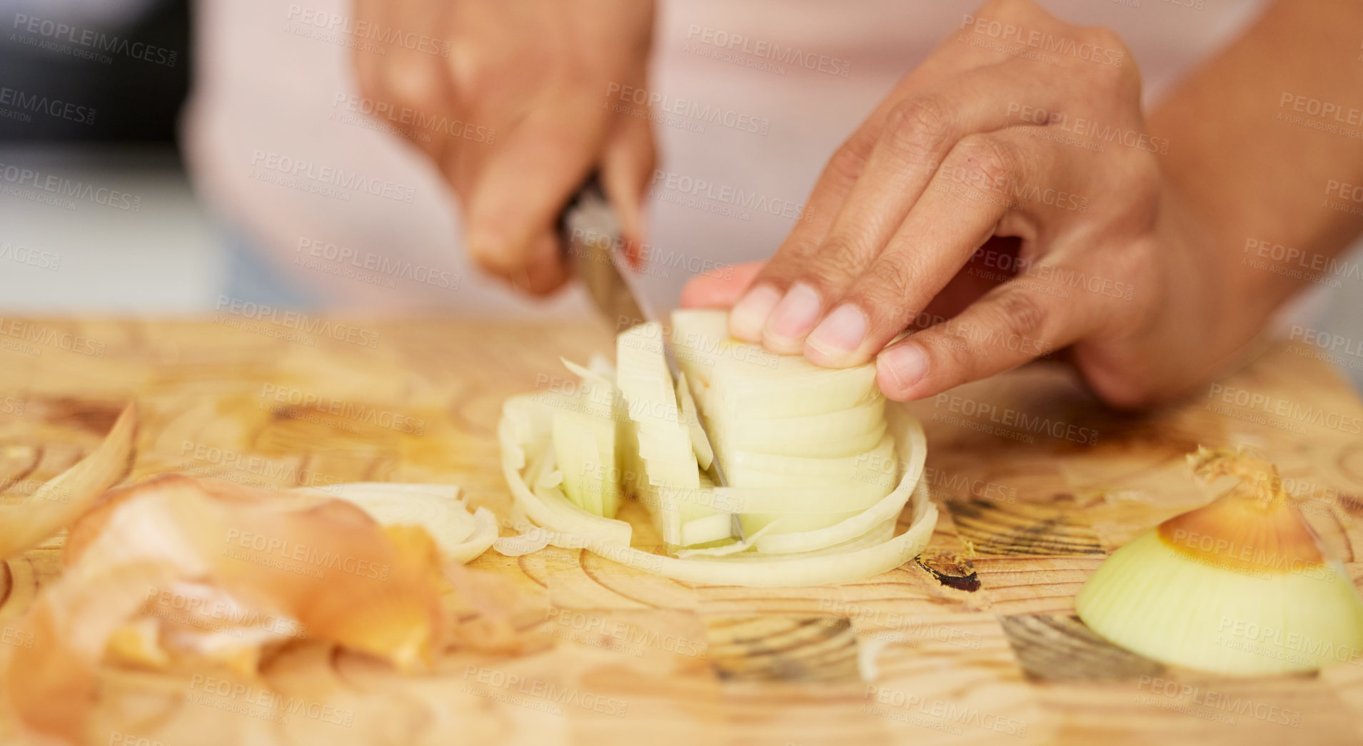 Buy stock photo Onion, dinner and hands in a kitchen with diet, nutrition and cooking in a home with chopping board. Eating, healthy and vegetable with vegan, organic and meal prep in a house for wellness and lunch