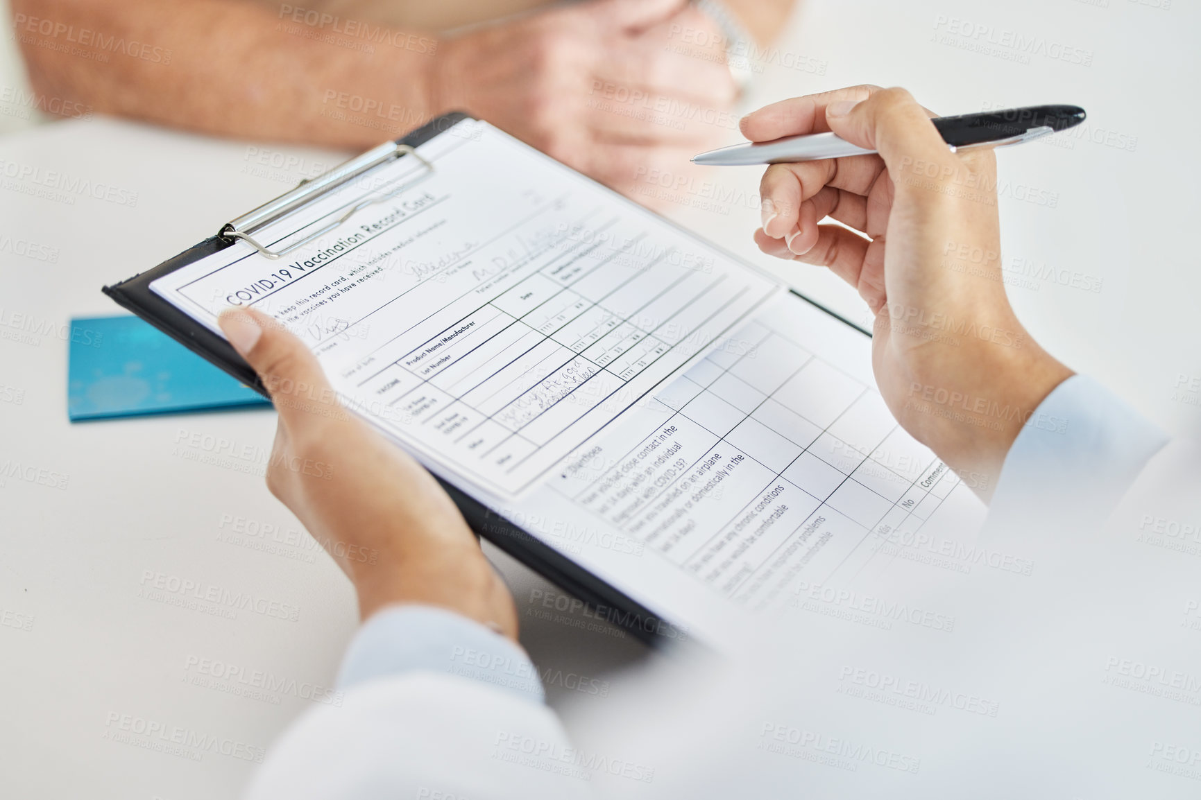 Buy stock photo Hands, doctor or writing on document for patient information on covid vaccine in hospital. Checklist, person or medical professional closeup with pen on paperwork for healthcare report, chart or card