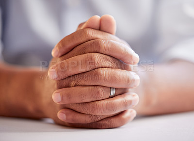 Buy stock photo Hands, prayer and closeup in office with faith, religion and connection with God for spiritual guide in career. Person, worship and mindfulness with gratitude, trust and peace at desk in workplace