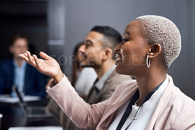 Buy stock photo Shot of a group of businesspeople having a meeting in a boardroom