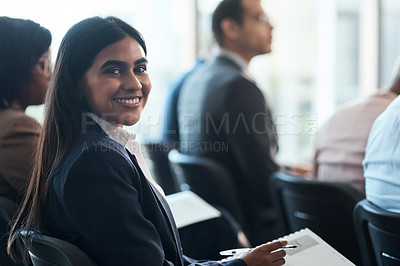 Buy stock photo Portrait of a young businesswoman during a conference in a modern office
