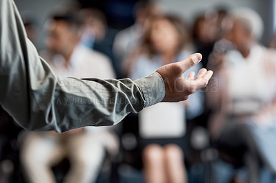 Buy stock photo Shot of an unrecognizable businessman delivering a presentation at a conference
