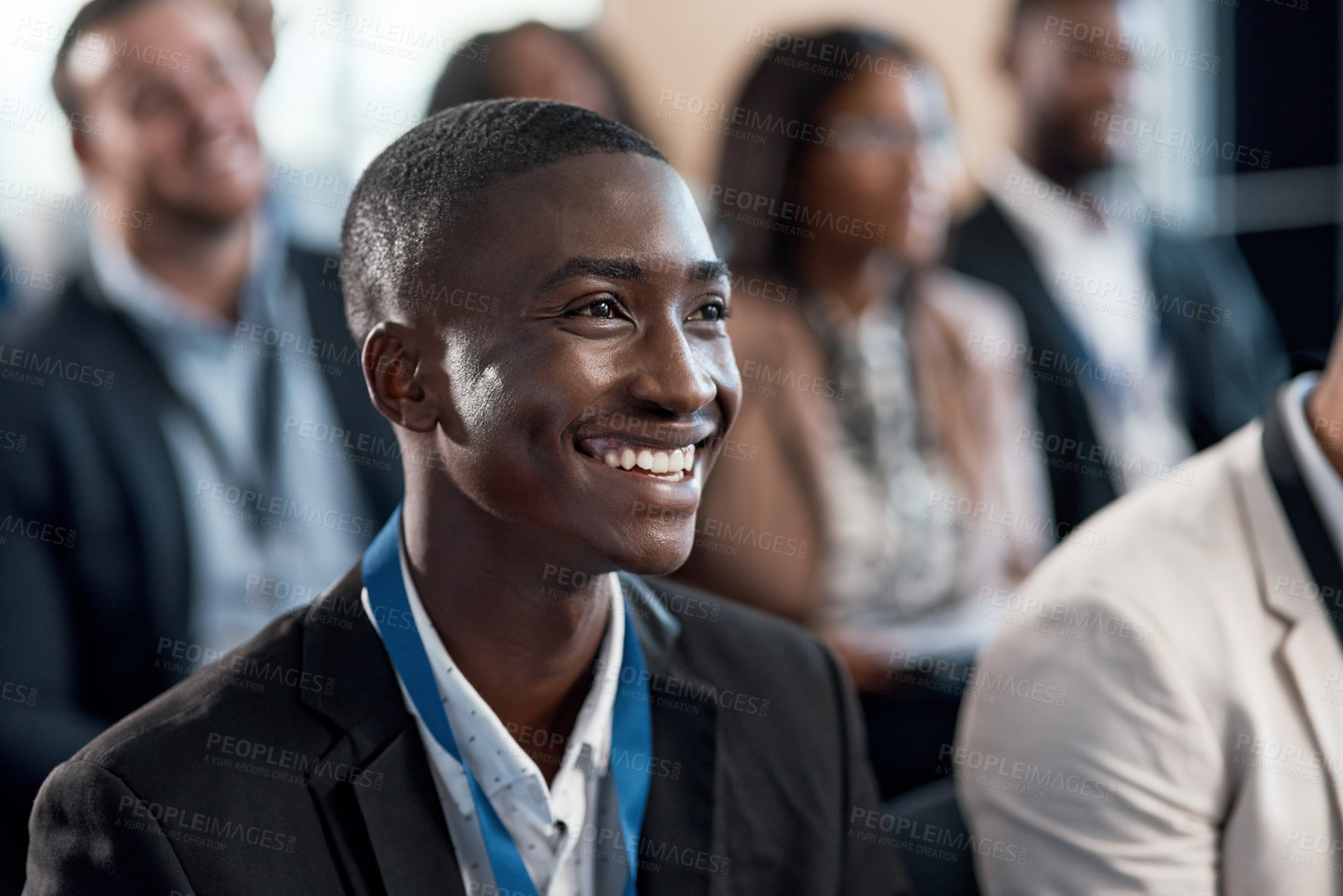 Buy stock photo Shot of a young businessman during a conference in a modern office