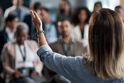 Buy stock photo Rearview shot of an unrecognizable businesswoman delivering a presentation at a conference