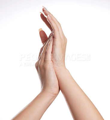 Buy stock photo Studio shot of unrecogniazble hands touching, against a white background