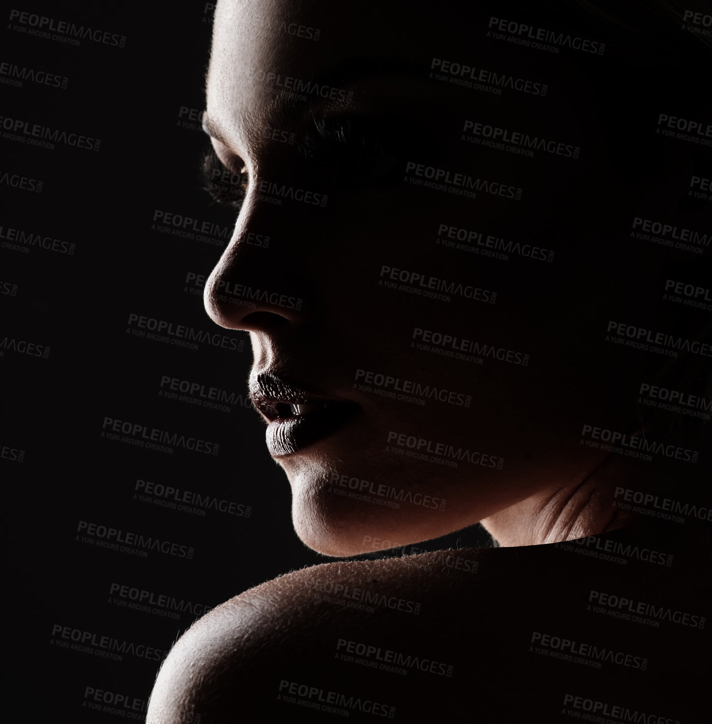 Buy stock photo Studio shot of a woman woman posing against a black background