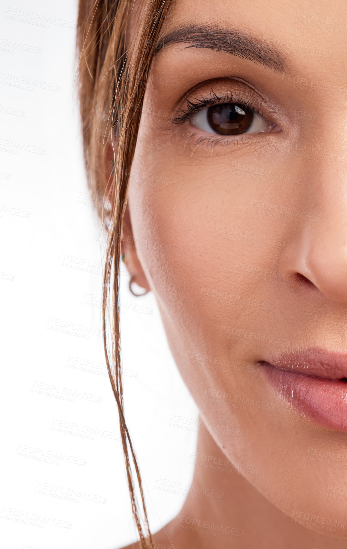 Buy stock photo Cropped shot of a young woman posing alone in the studio