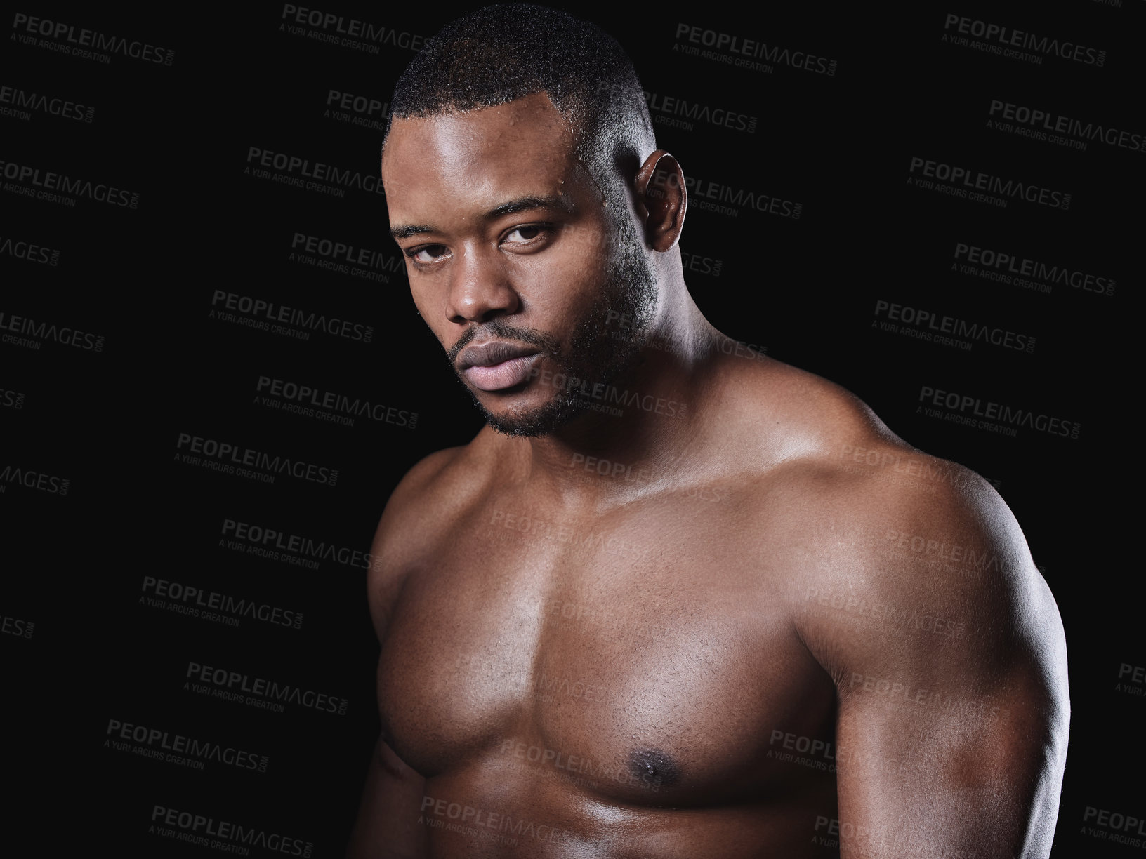 Buy stock photo Black man, portrait and strong in studio for exercise, strong bodybuilder or training for wellness. Male athlete, dark background and healthy for shirtless workout, stomach with muscle for gym sport