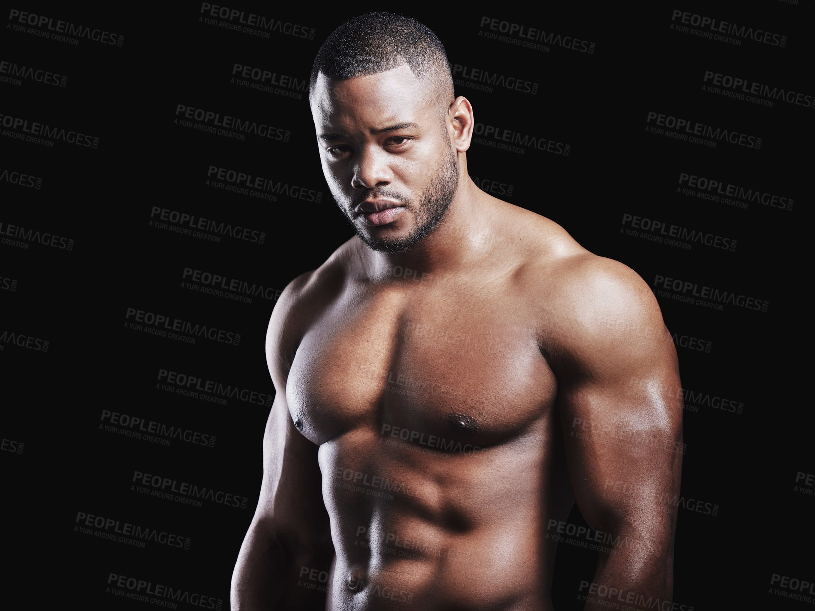 Buy stock photo Black man, portrait and strong in studio for exercise, strong bodybuilder or training for wellness. Male athlete, dark background and healthy for shirtless workout, stomach with muscle for gym sport